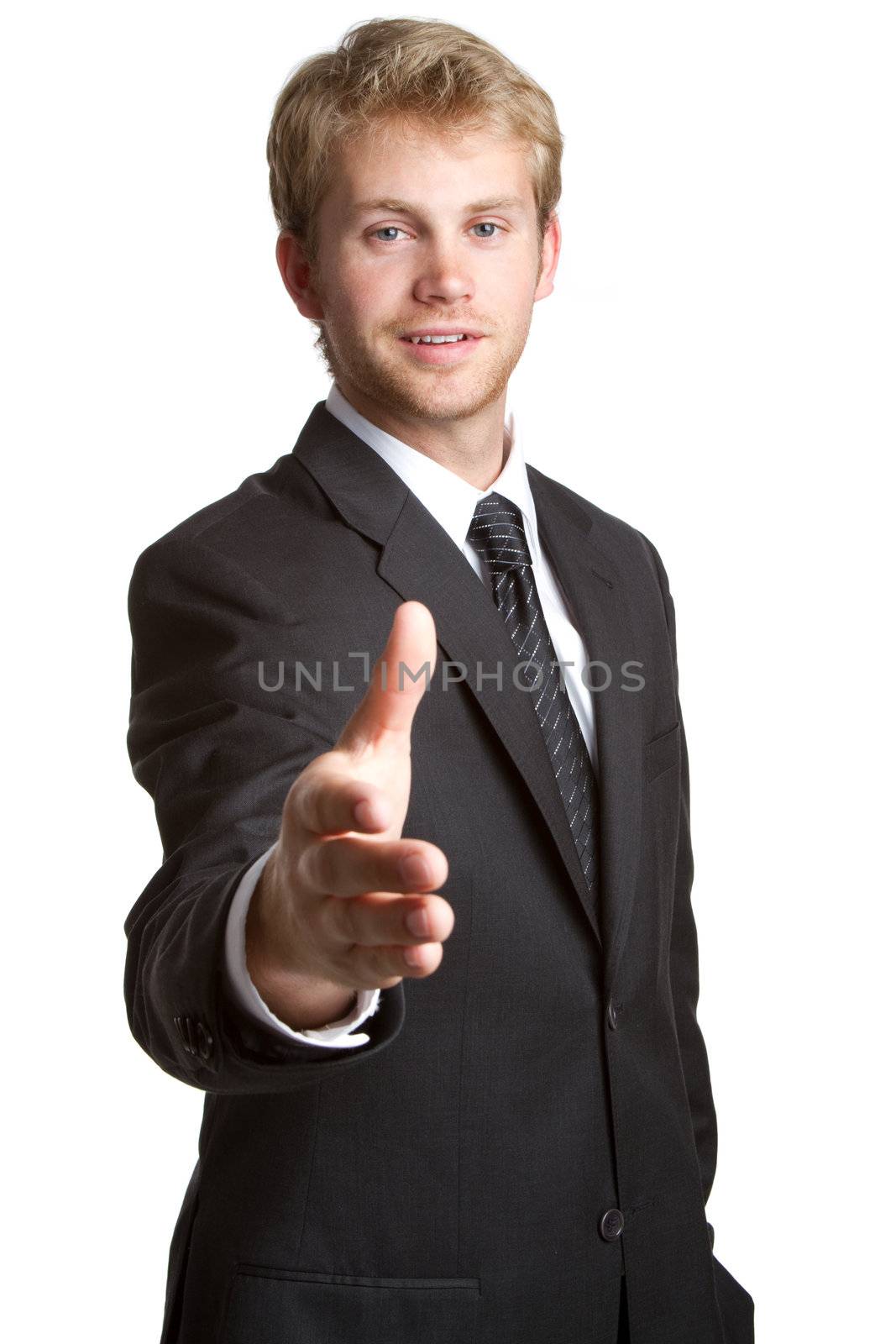 Young isolated businessman giving handshake