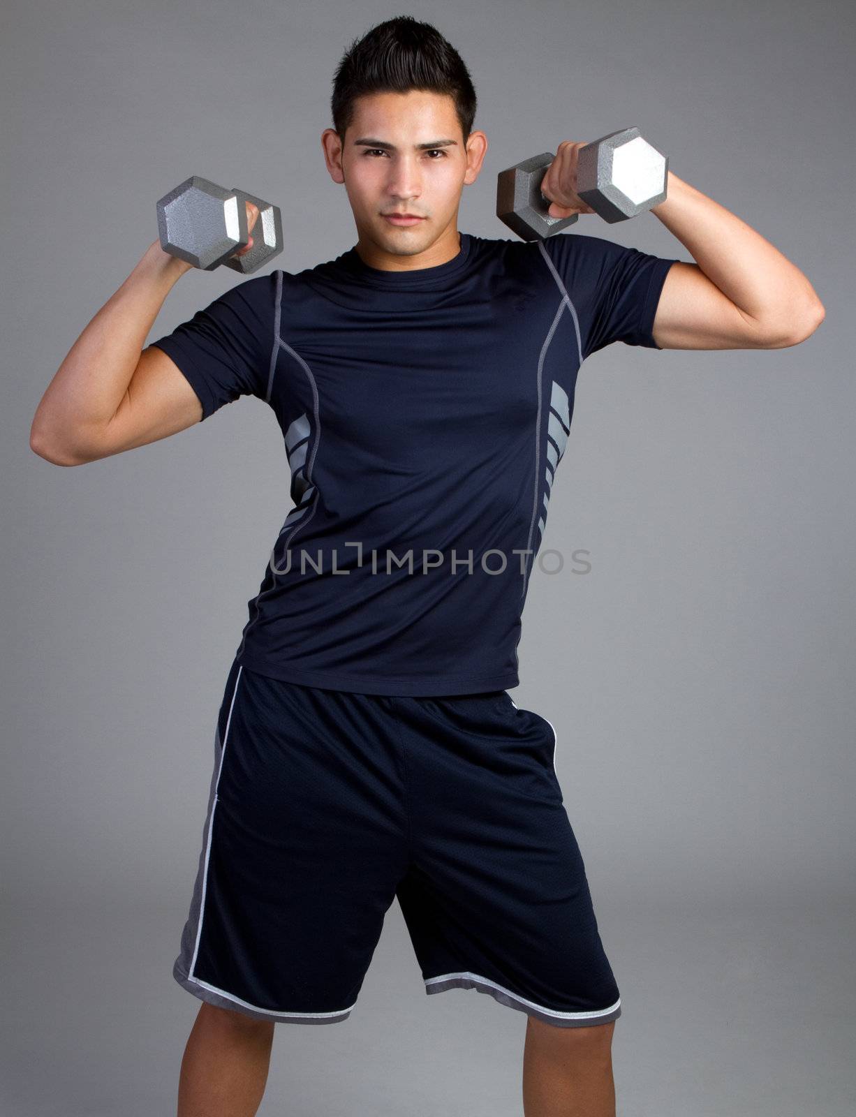 Young hispanic fitness man exercising