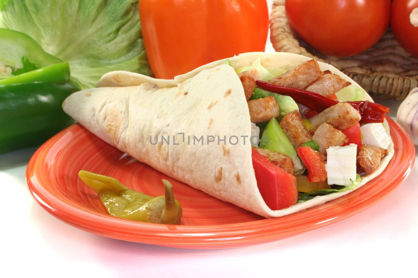 Wrap with mixed vegetables, cheese and turkey strips