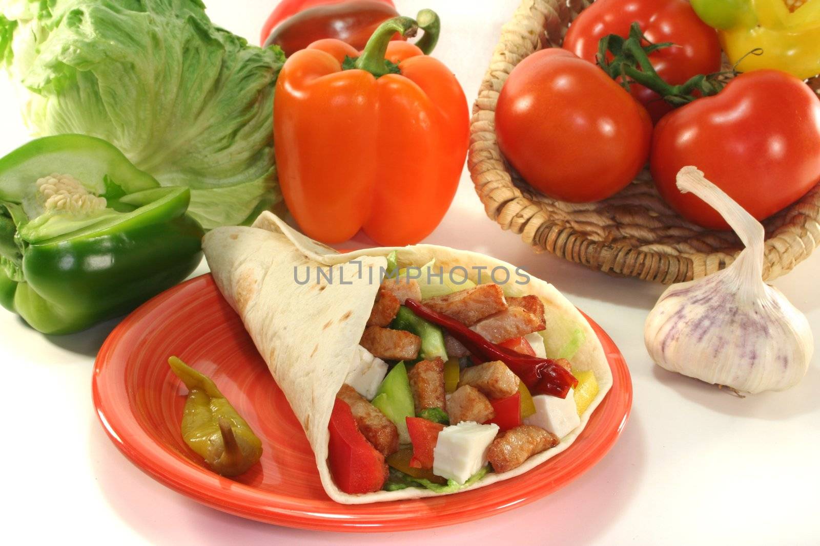 Wrap with mixed vegetables, cheese and turkey strips