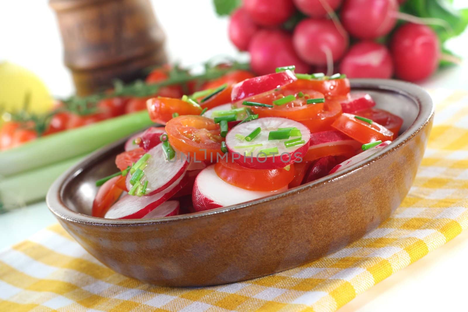 fresh radish and tomato salad with chives