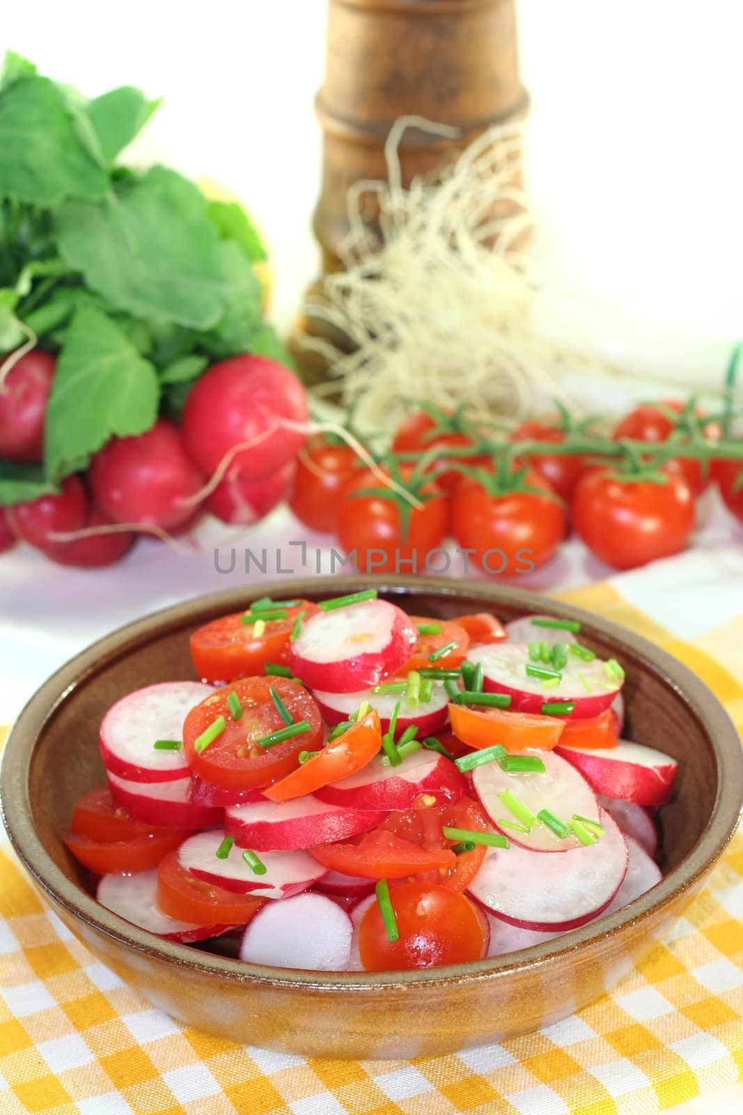fresh radish and tomato salad with chives