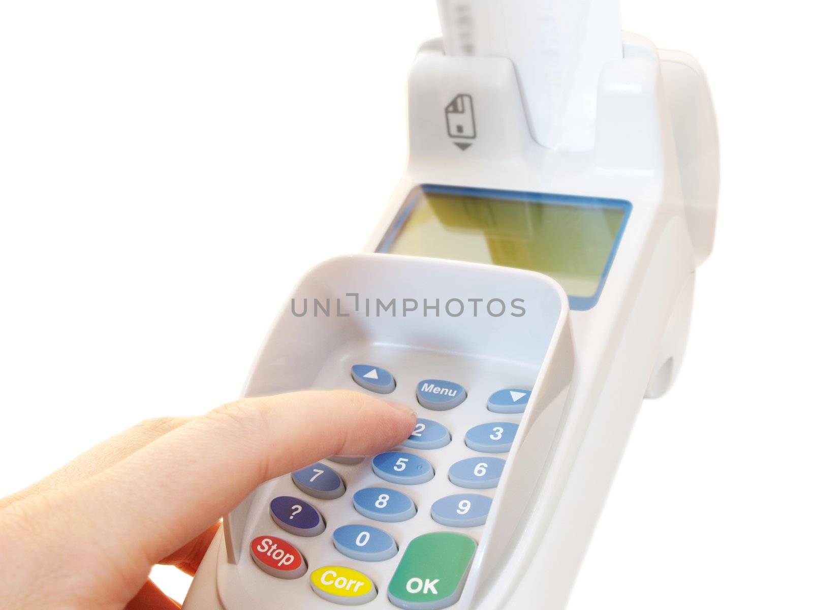 Person at a payment terminal, entering the PIN