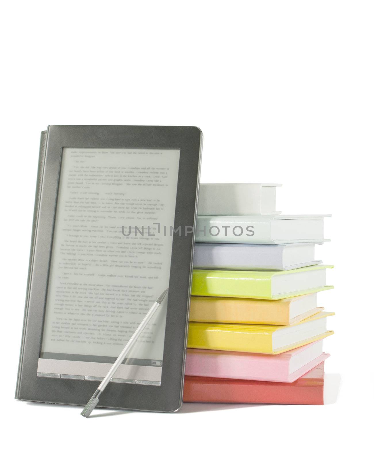 Stack of colorful books and electronic book reader on the white background