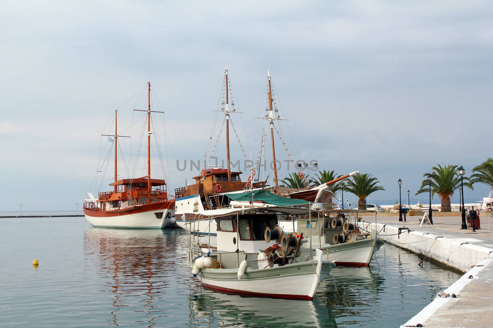 fishing boats and sailboats by goce