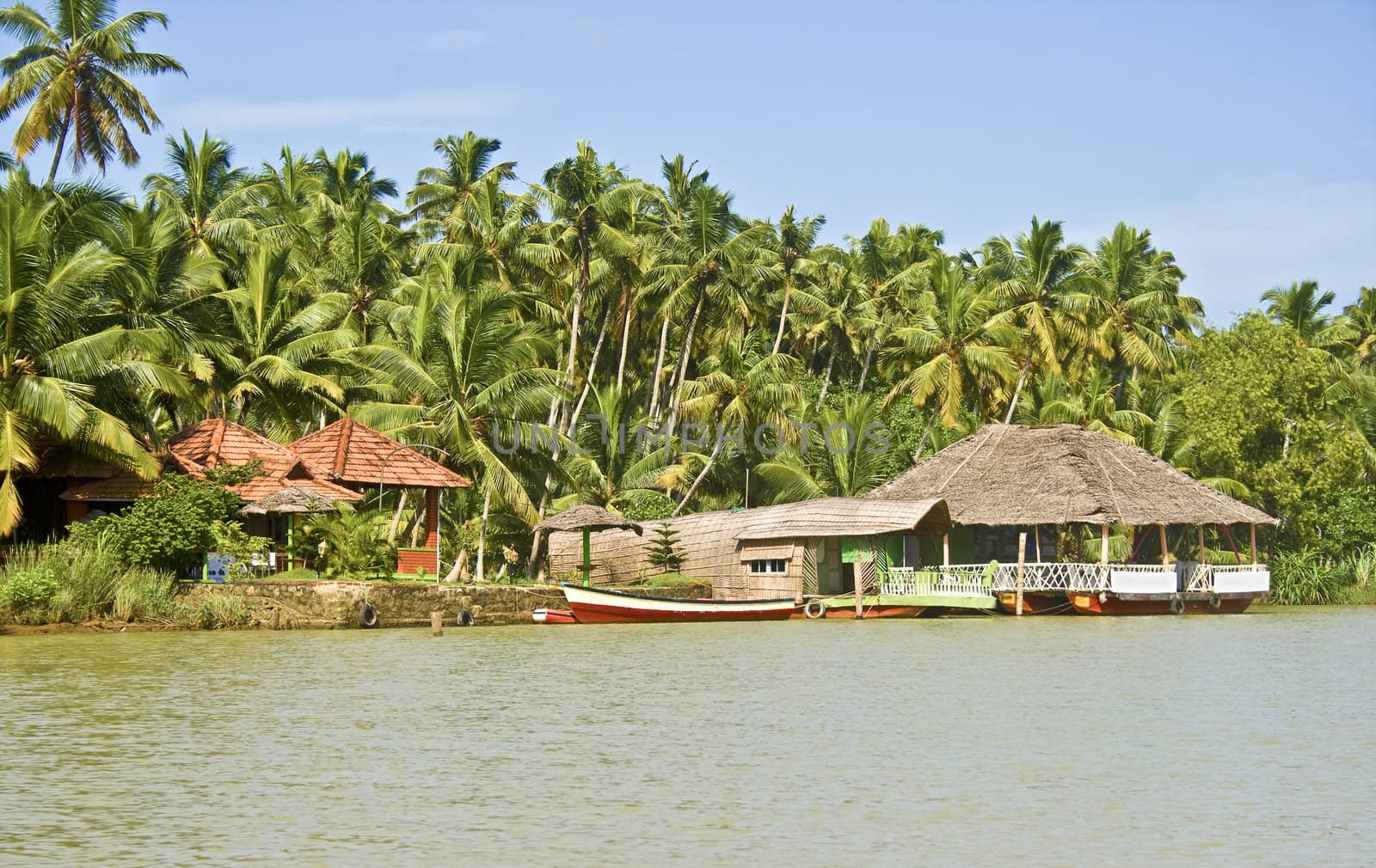 Kerala backwaters at trivandrum lake with a houseboat