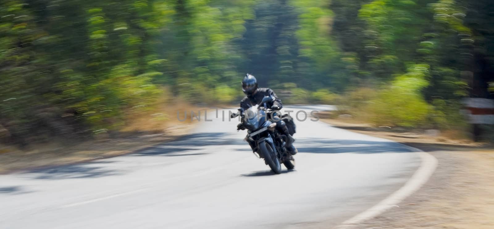 biker caught opening throttle on country road india