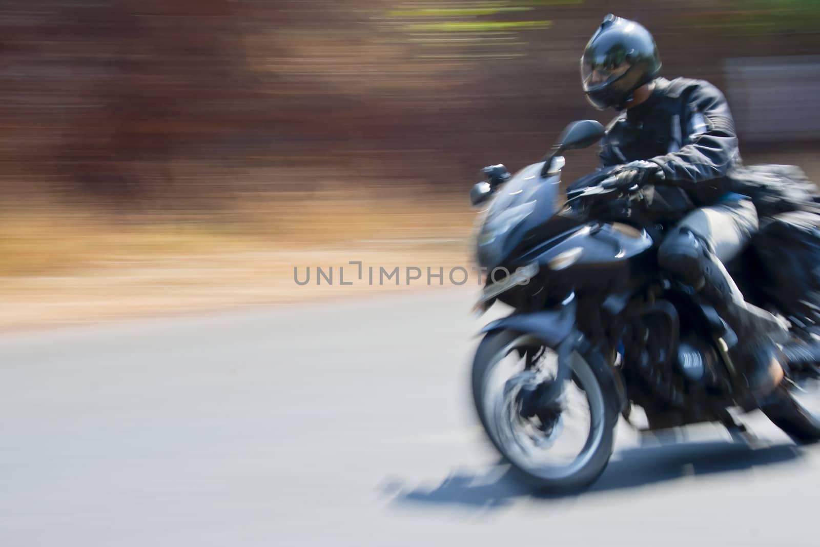 road burning motorcyclist, Goa to Mumbai, India