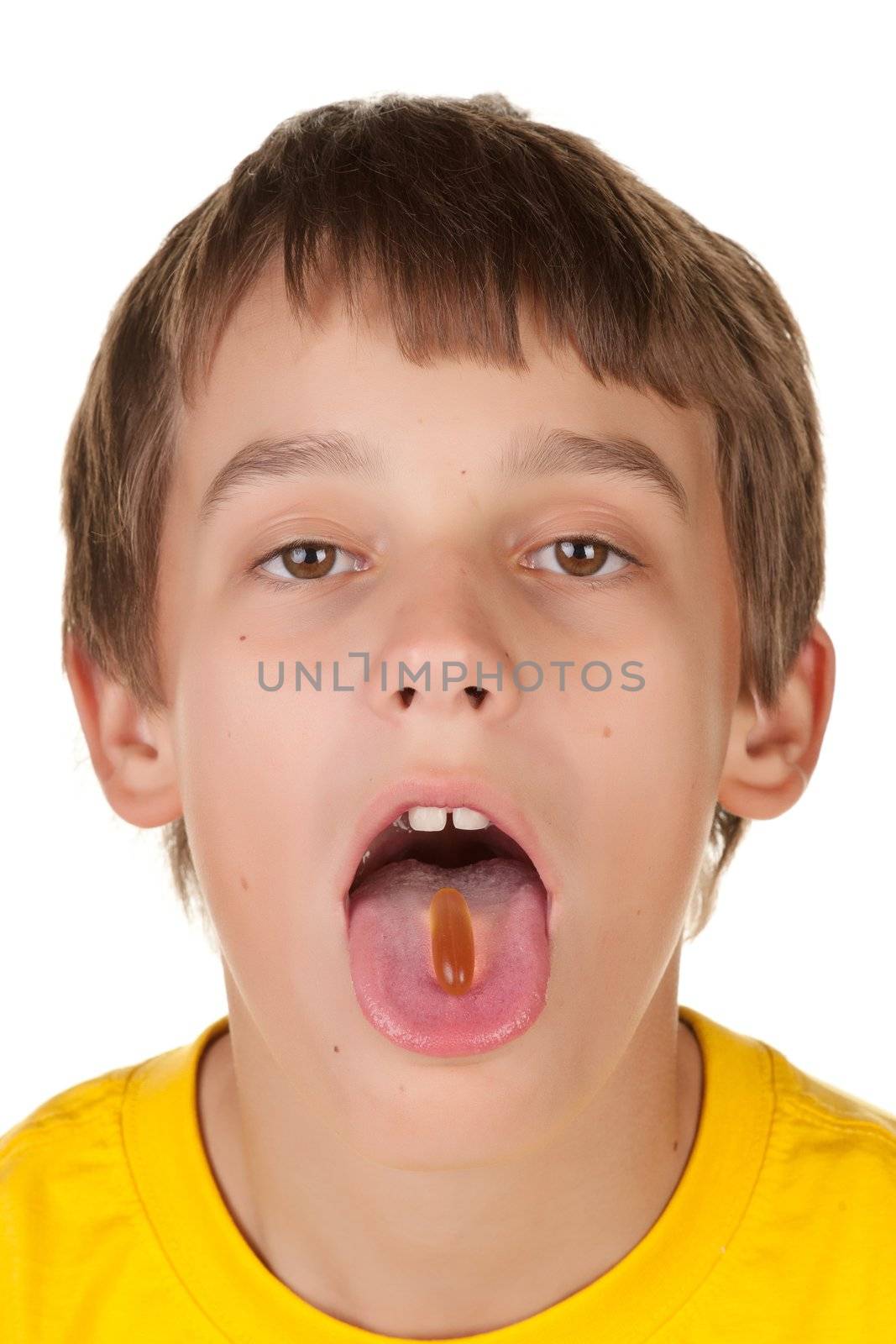 boy taking a pill by clearviewstock