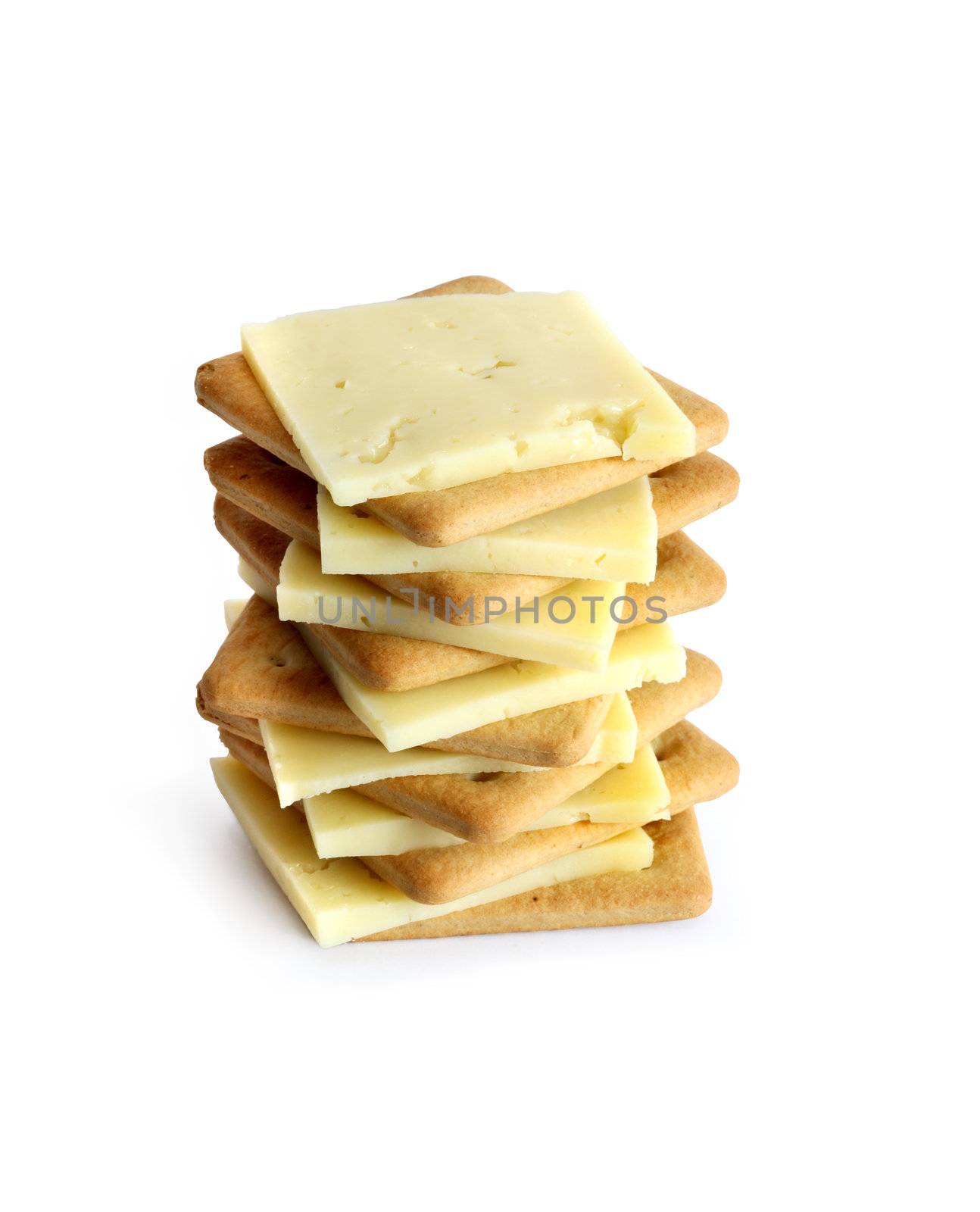 Stack of crackers with cheese on white background. Isolated with clipping path