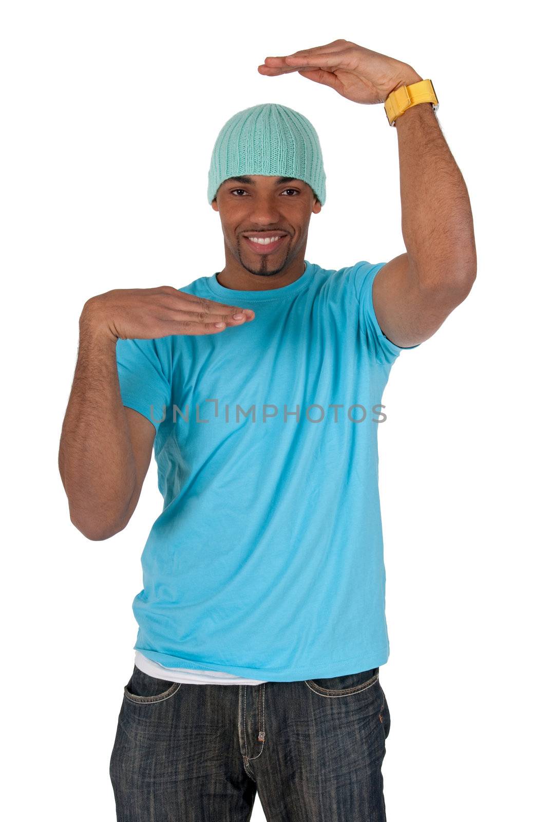 Young guy in a blue t-shirt making a frame with his arms. Isolated on white background.