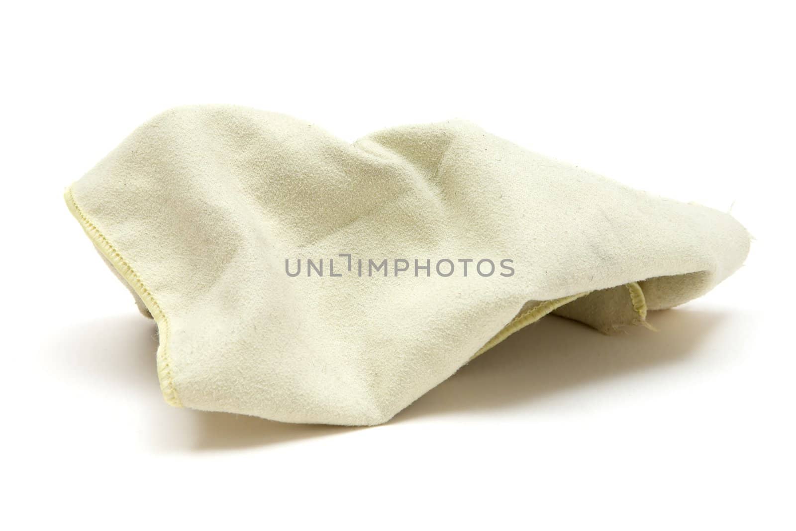 Dirty cleaning rag. White background.