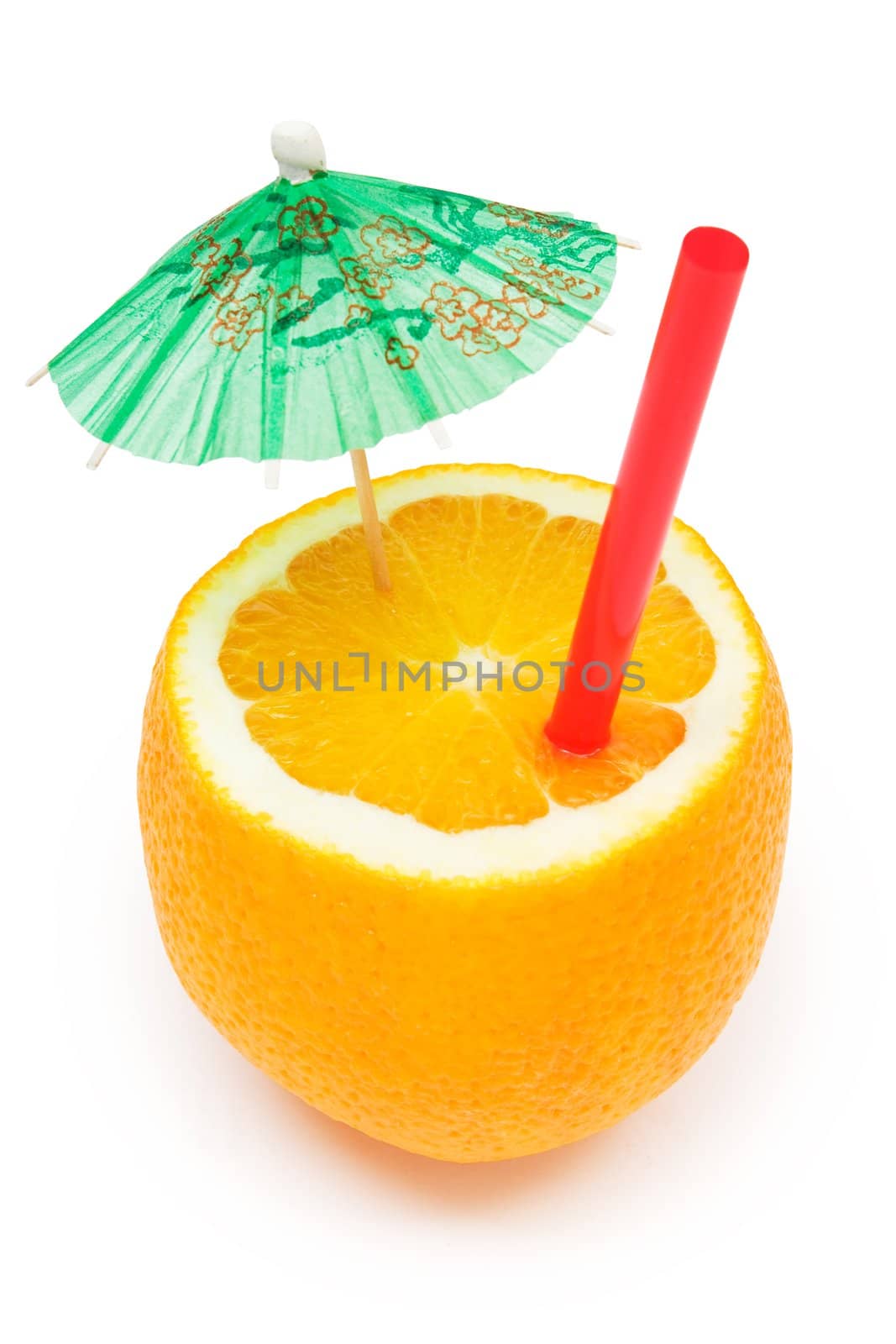 Chopped orange with drinking-straw and a small umbrella. Isolated on a white background.