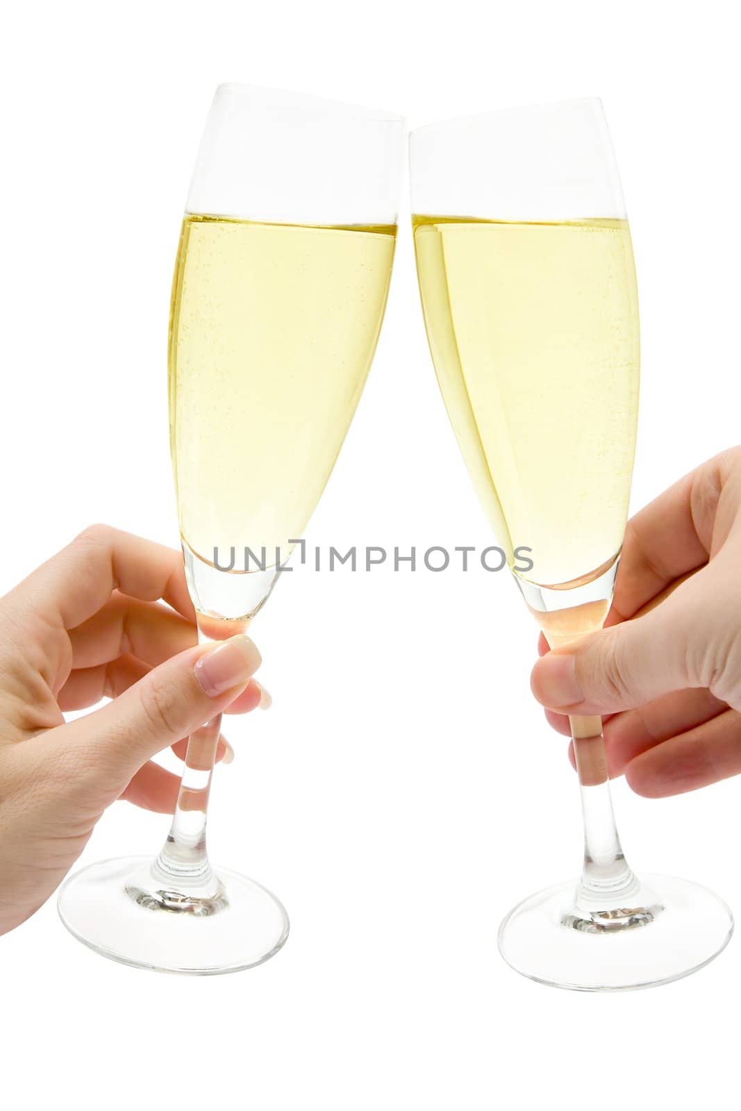 Man and woman celebrating with two glasses of champagne. Isolated on a white background.