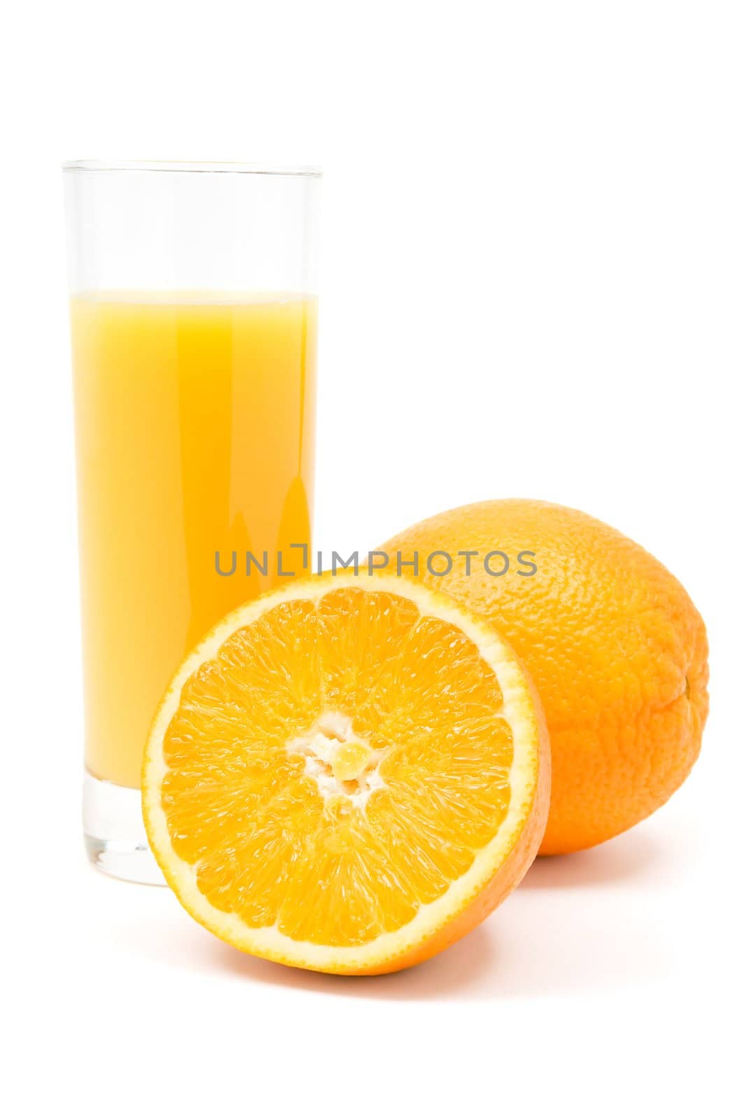 Glass of juice and oranges. White background.