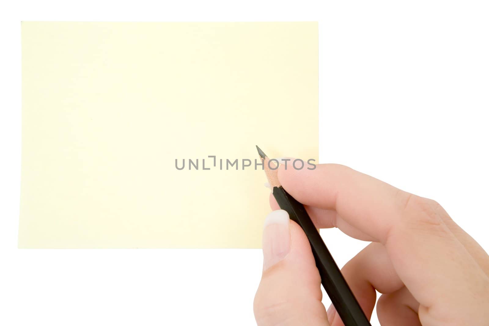 Female hand writing on a blank note. Isolated on a white background.