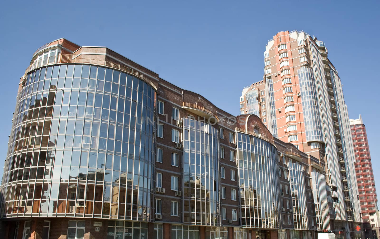 modern residential building with glassed facade in Saint-Petersburg, Russia