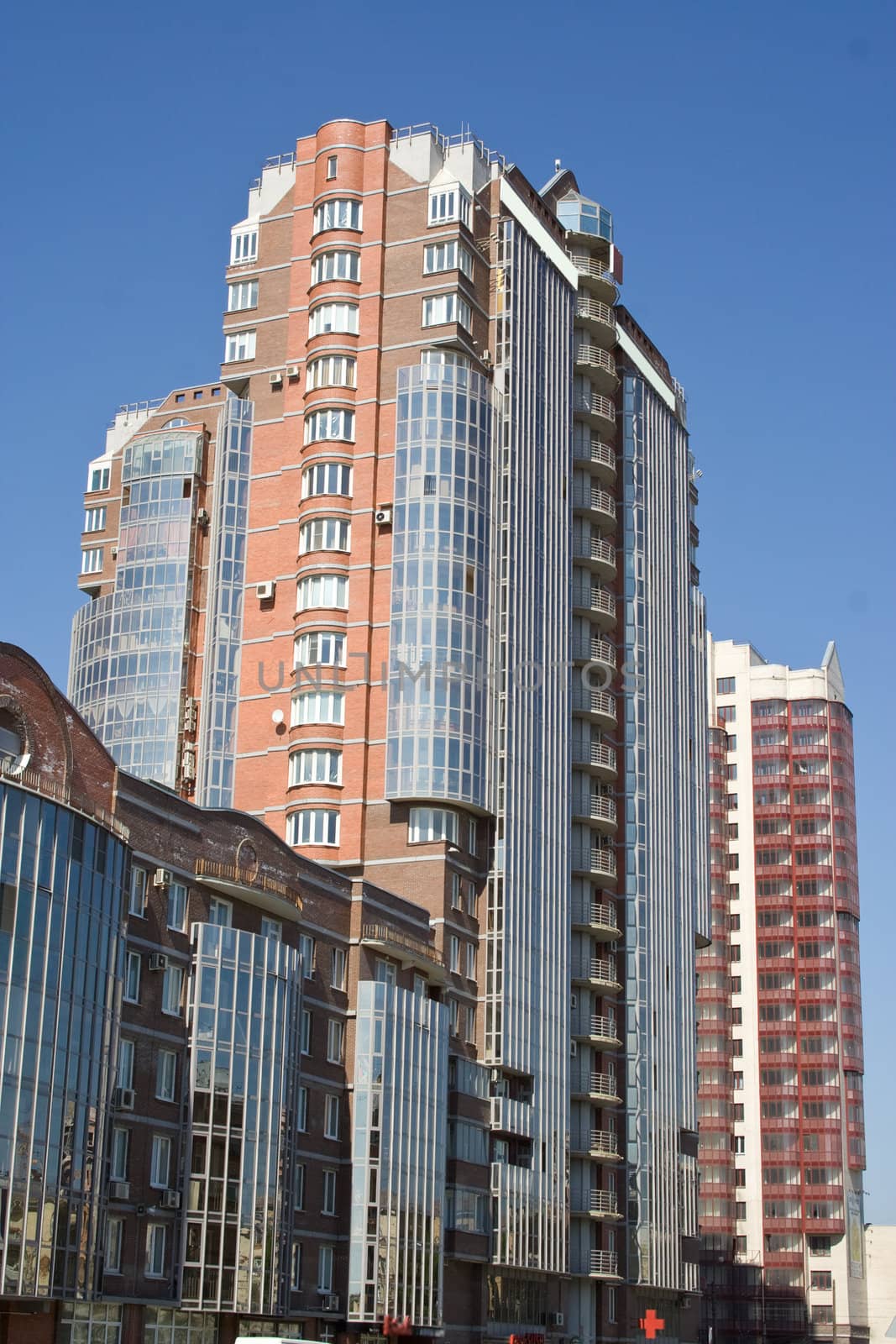 modern residential building with glassed facade in Saint-Petersburg, Russia