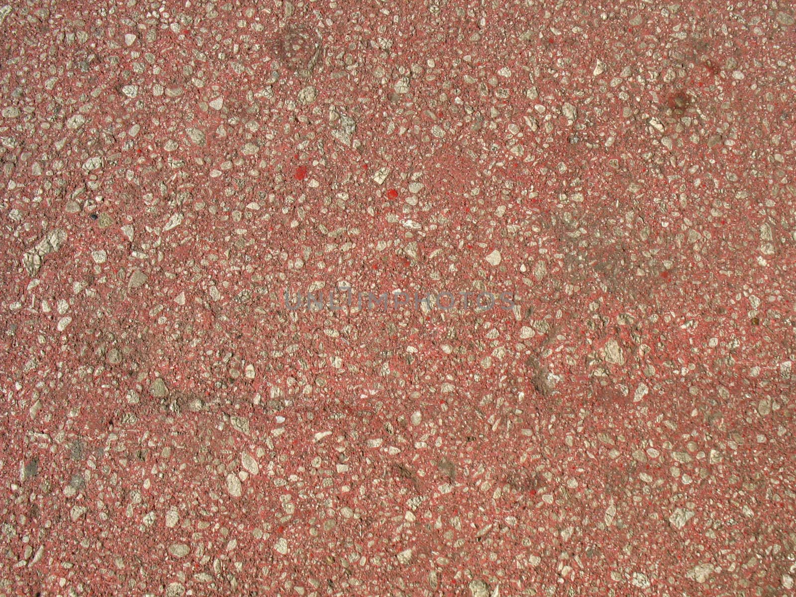  A structure of pink asphalt with impregnations.
