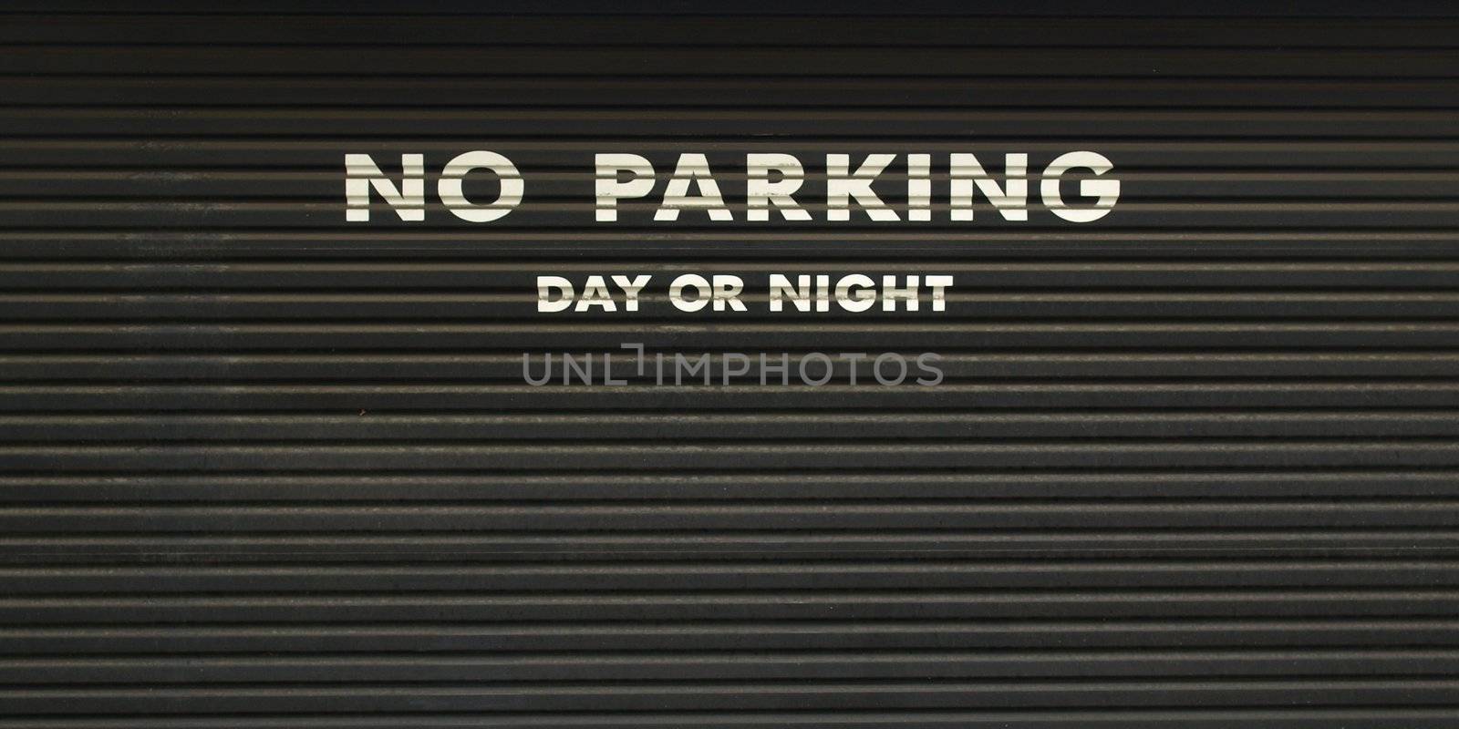 A road sign for a no parking area