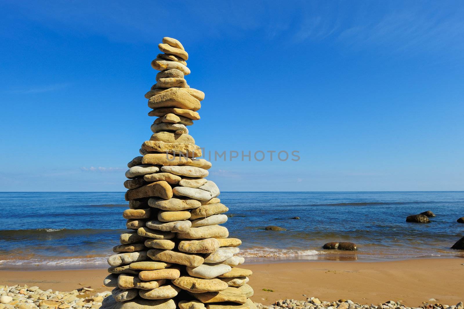 High pile of the cobblestones on the seacoast