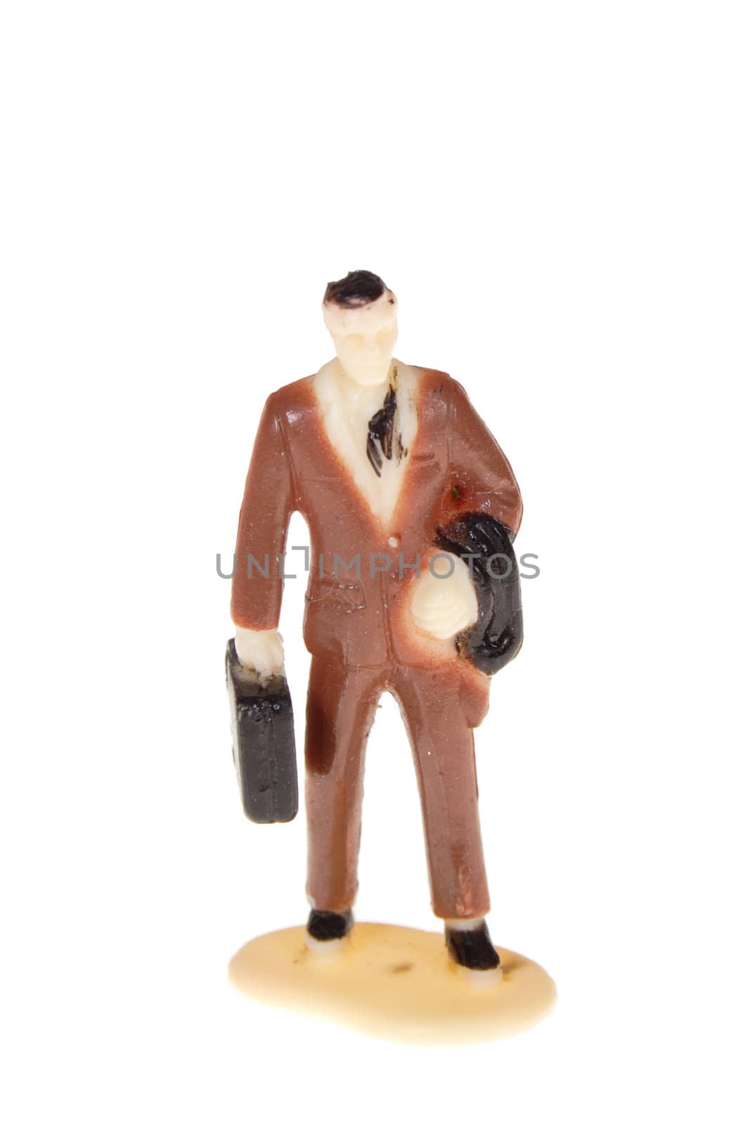 man from briefcase figurine, photo on the white background