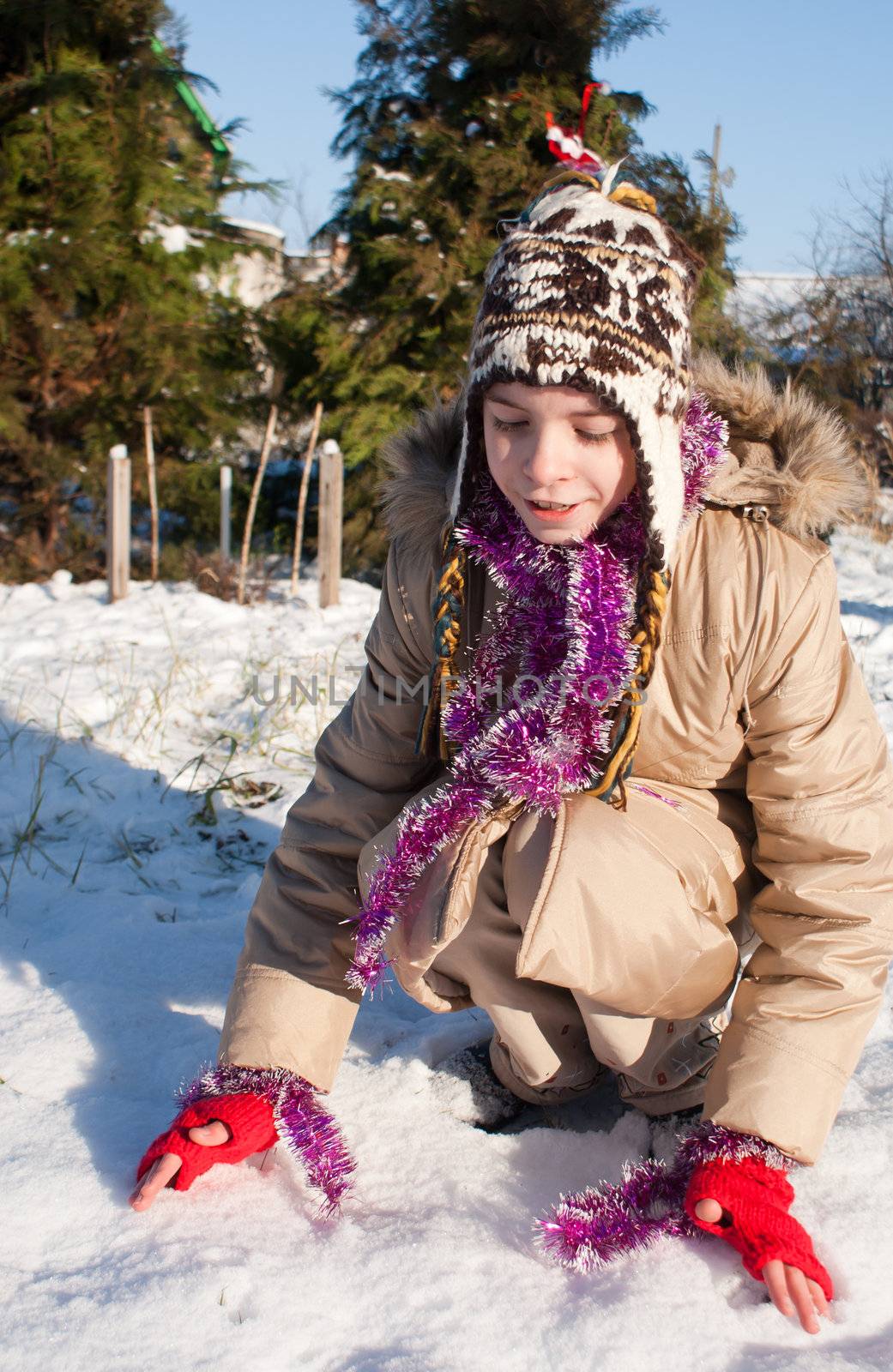 Girl playing with snow by AndreyKr