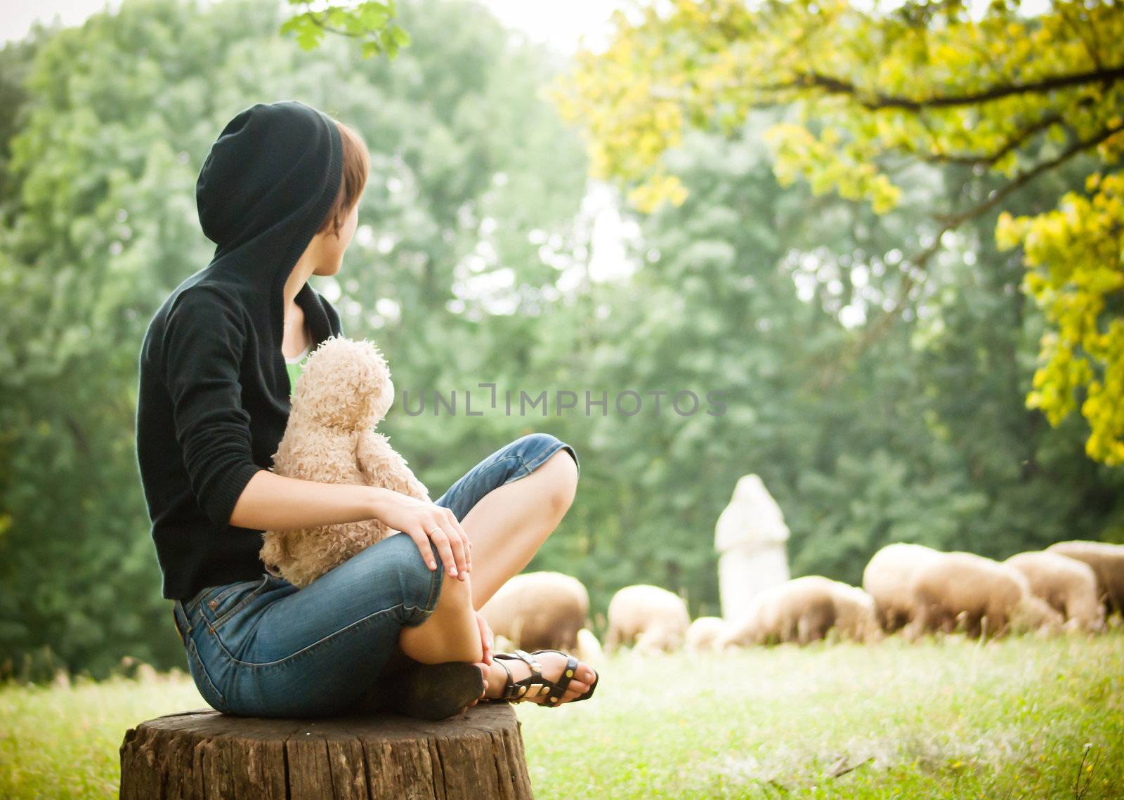 A lady seating outdoors