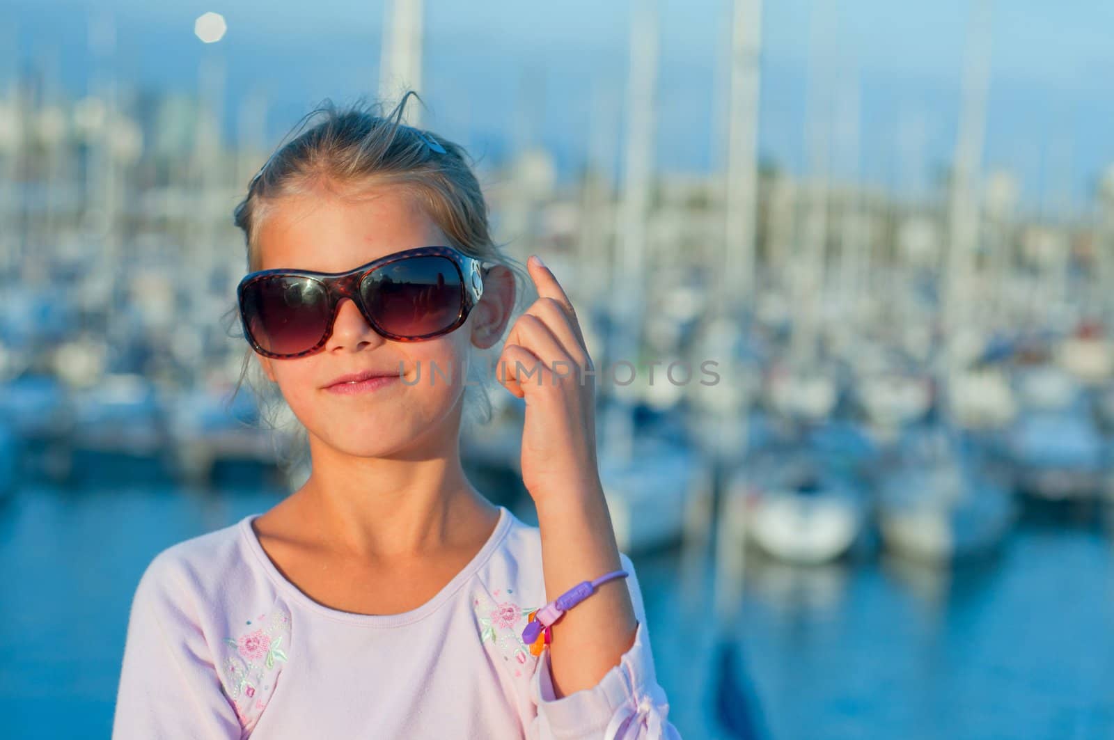 Portrait of a girl in the background of yachts by maxoliki