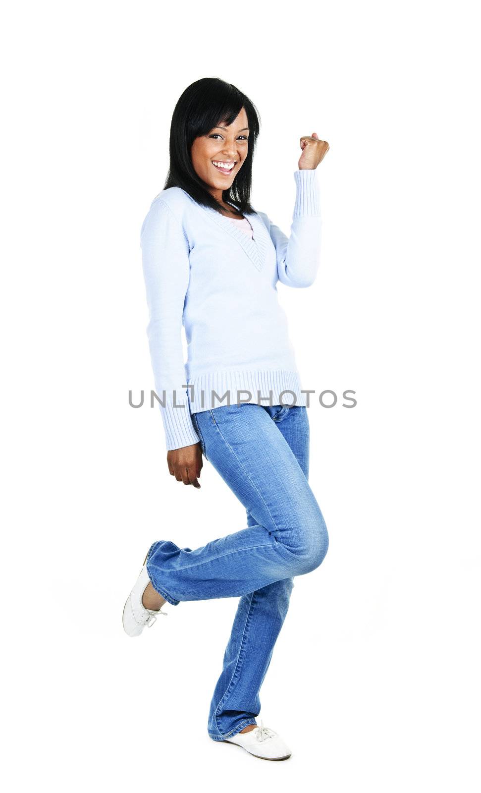 Happy black woman celebrating isolated on white background