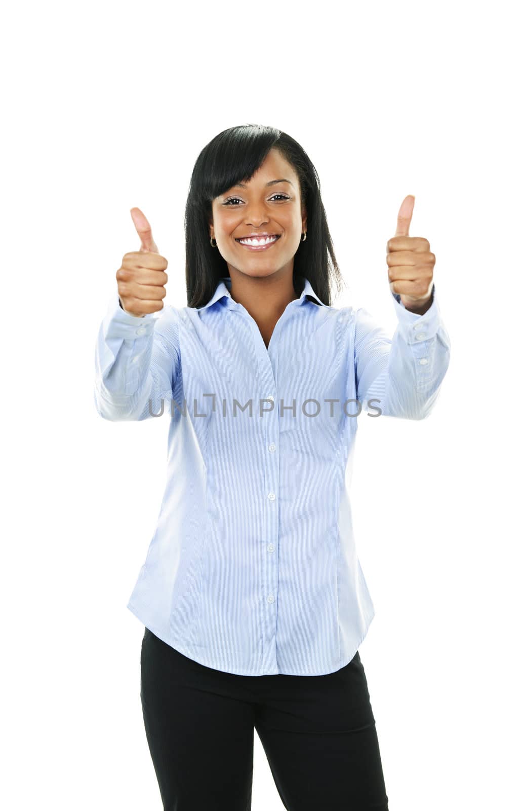 Smiling black woman gesturing thumbs up isolated on white background