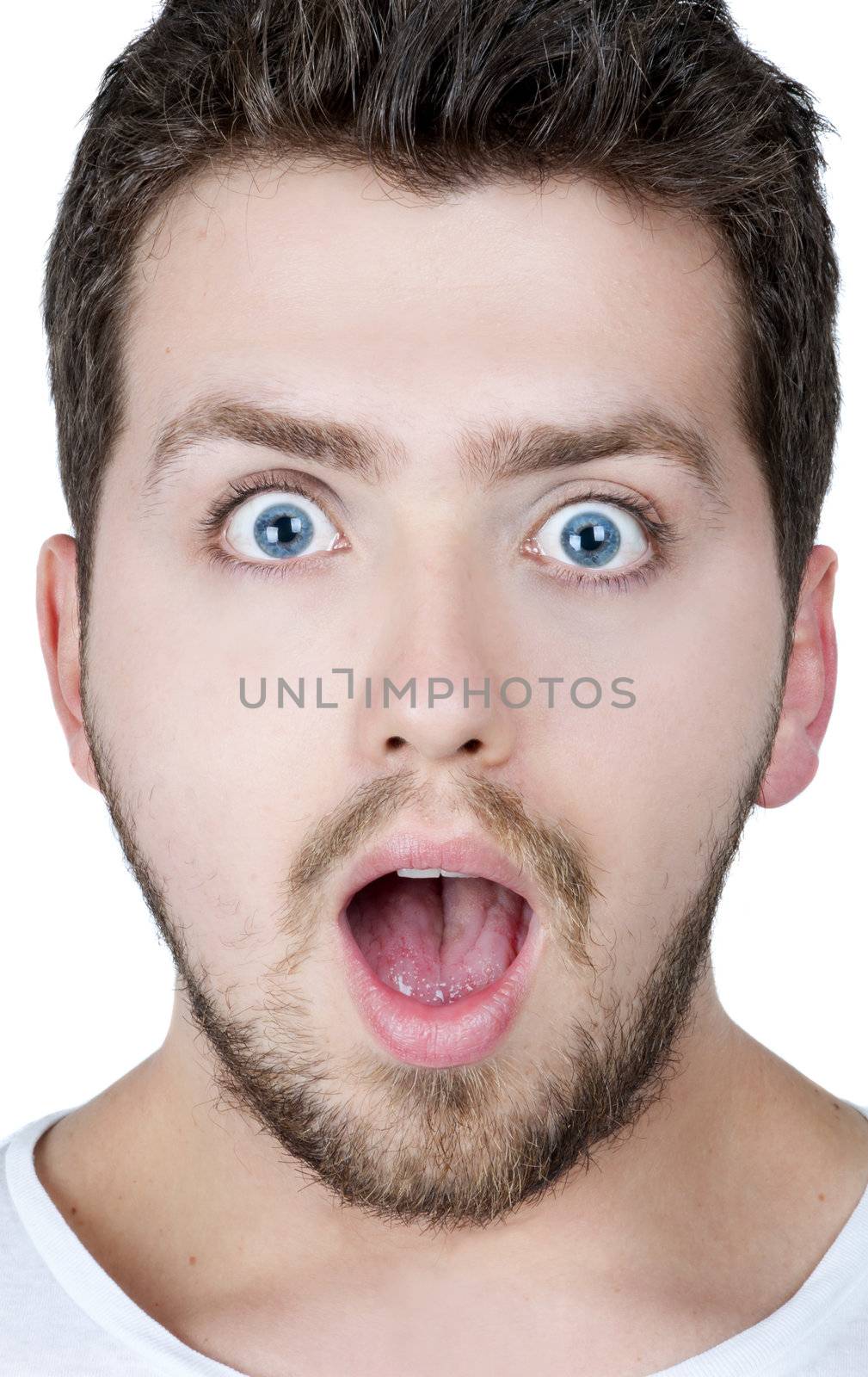 Young blonde man with blue eyes surprised, isolated