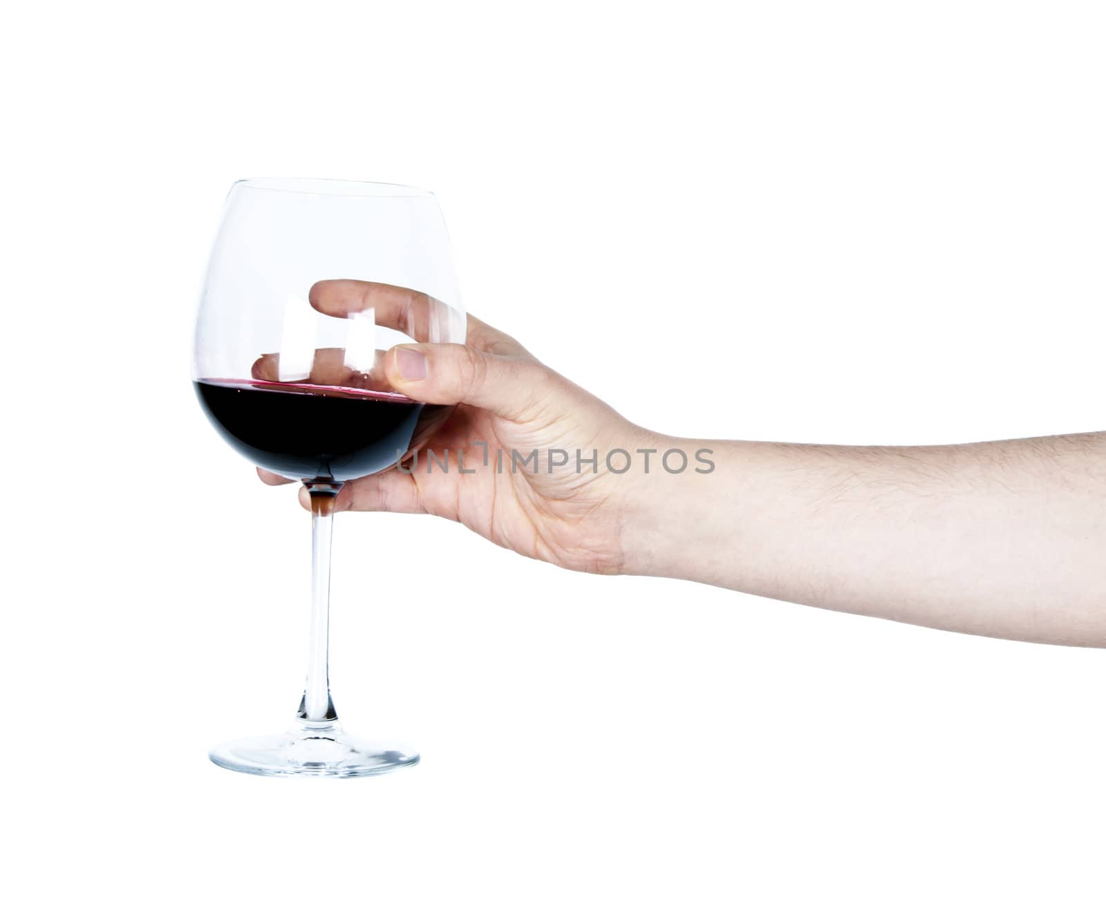 Isolated image of hand holding a glass of red wine on white
