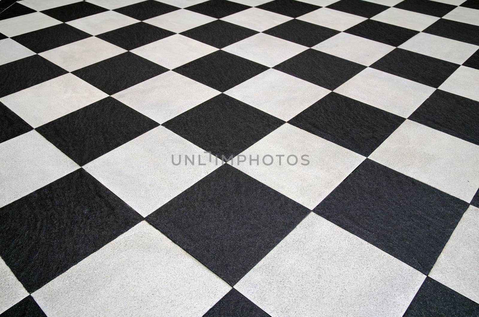Perspective of Square black and white tiles floor