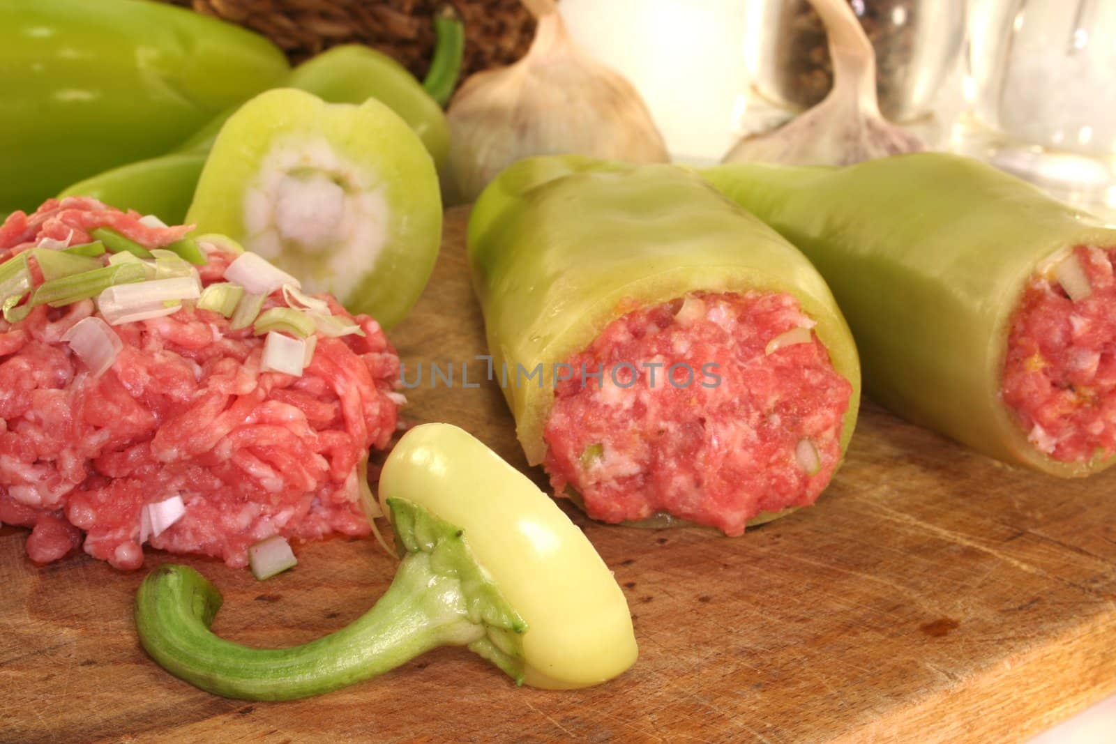 raw stuffed peppers with minced pork and onions