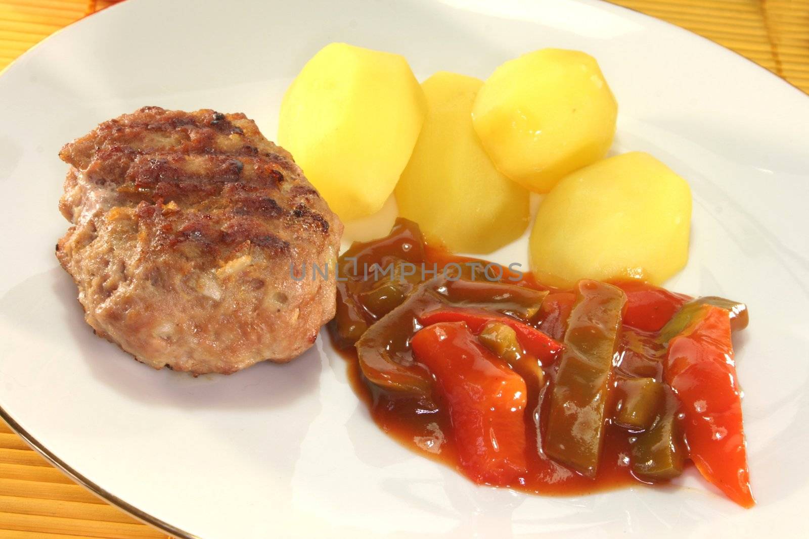 fried meatballs with Ratatouille and fresh potatoes