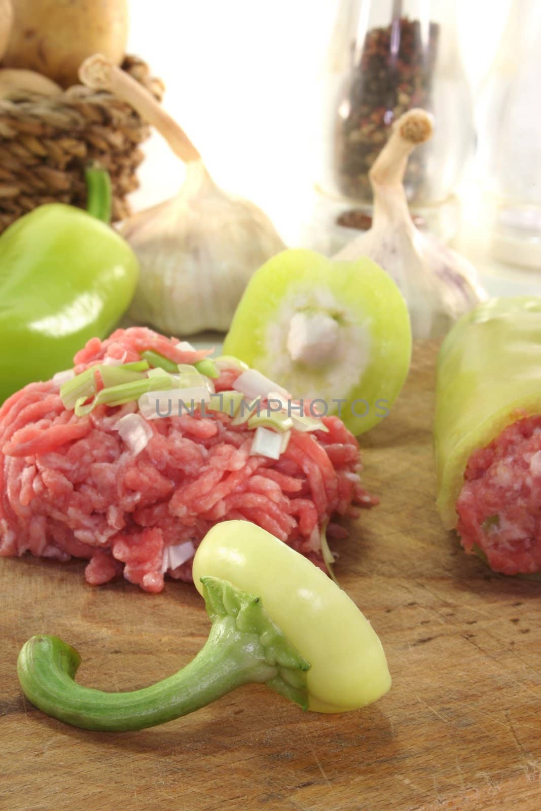 raw stuffed peppers with minced pork and onions