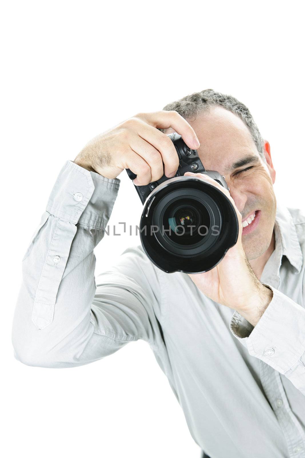 Portrait of male photographer with camera isolated on white background