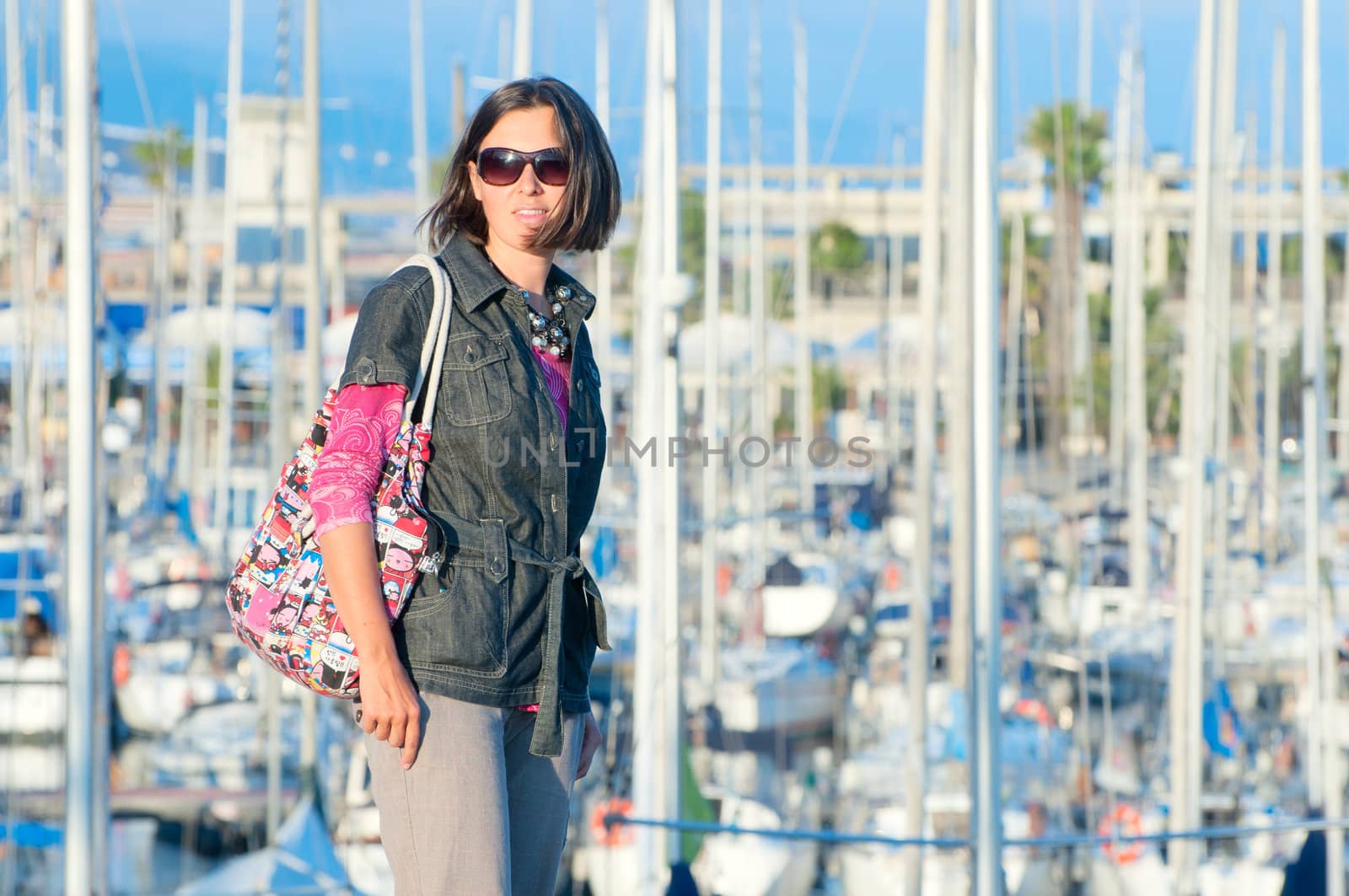 Portrait of woman in the background of yachts by maxoliki