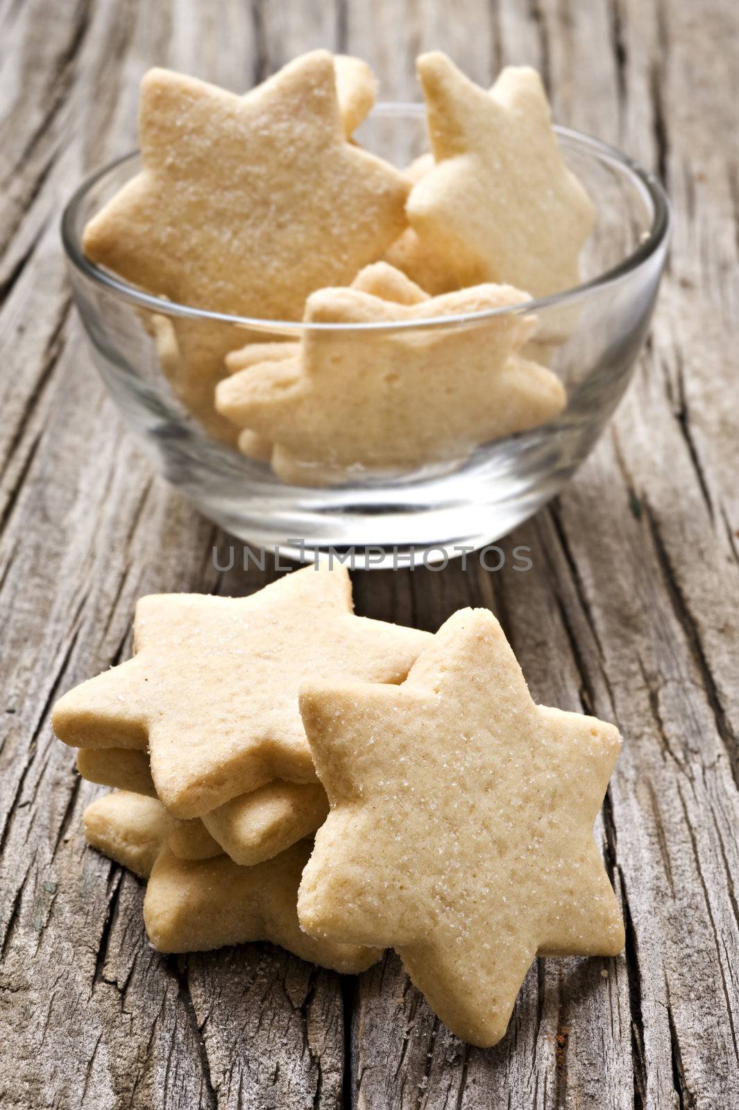 Sugar coated shortbread cookies in star shapes stacked up