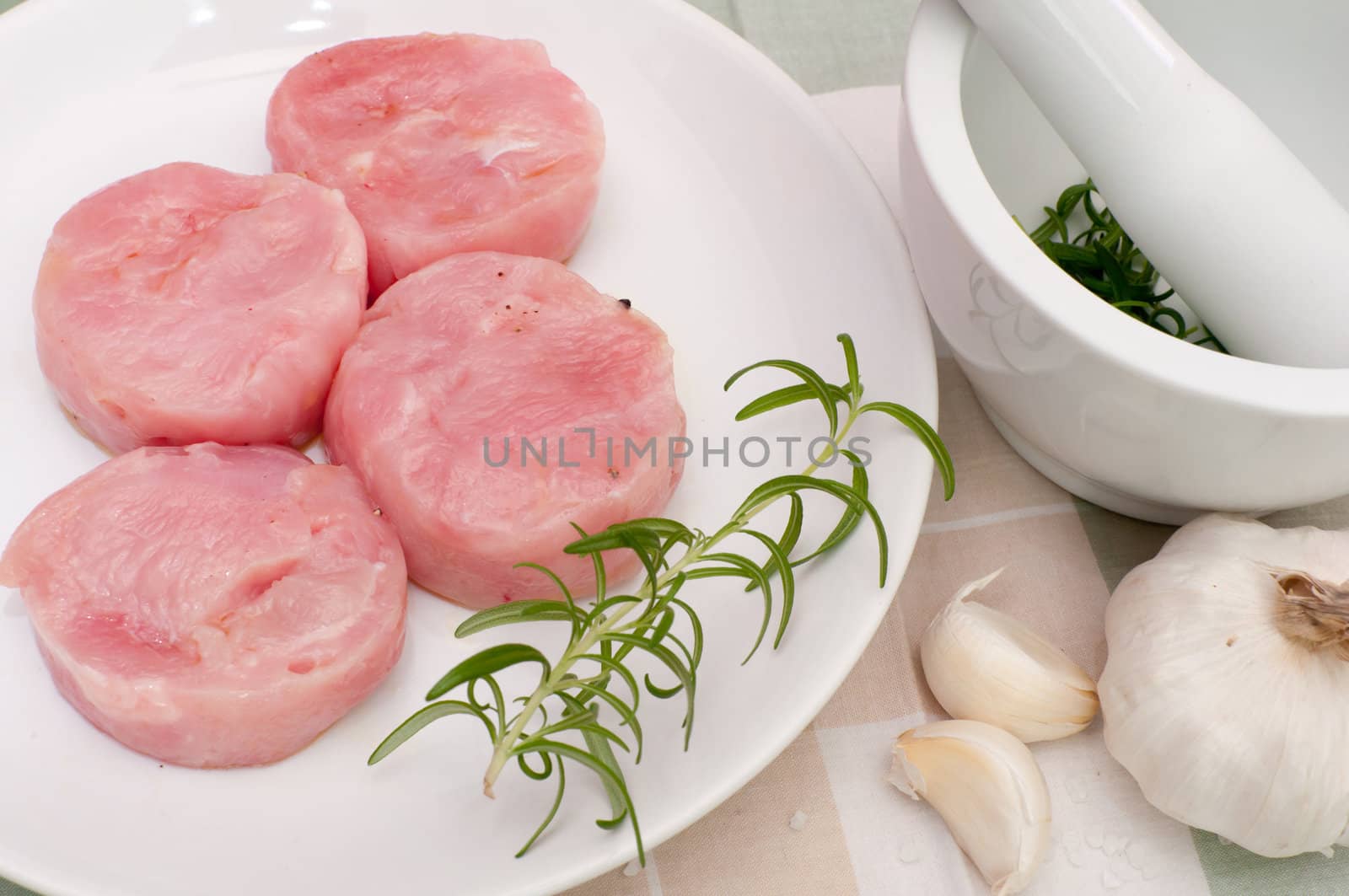 Raw Turkey Medallions With Garlic and Rosemary Marinade