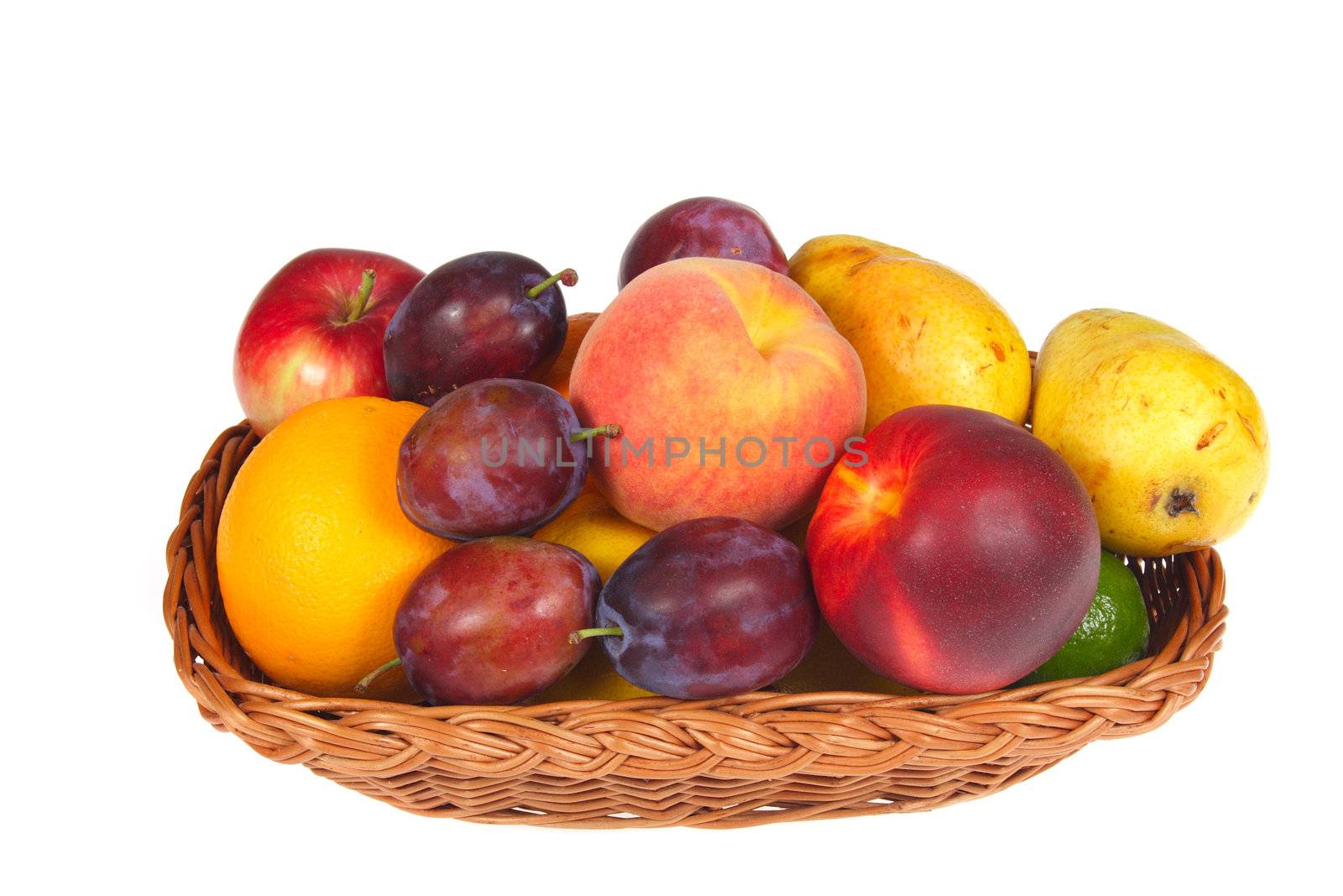 fresh fruits in a basket,  photo on the white background