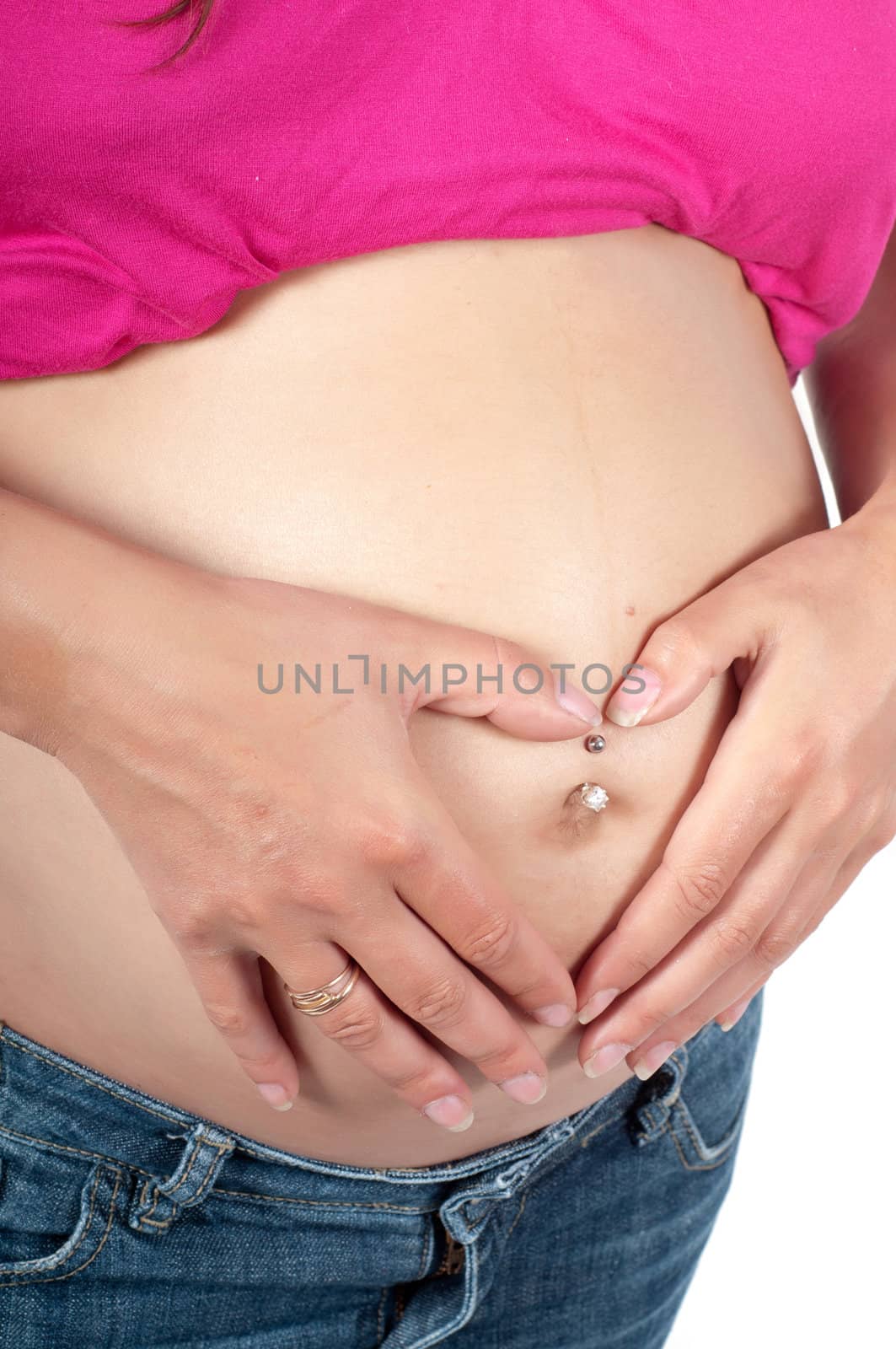 Beautiful pregnant woman in studio isolated on white