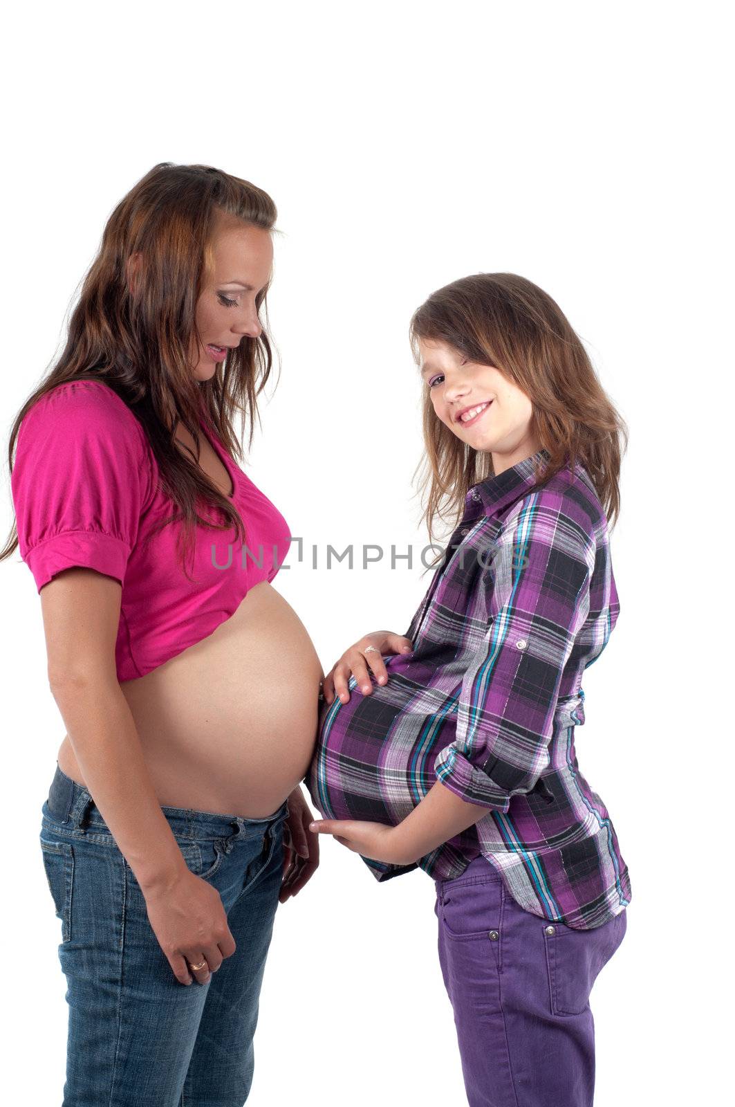 Beautiful pregnant woman in studio isolated on white