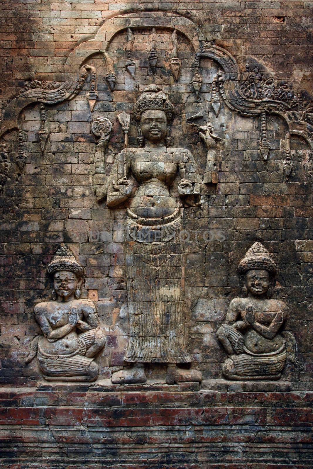 A carved brick wall in the Angkor temples in Siem Reap, Cambodia
