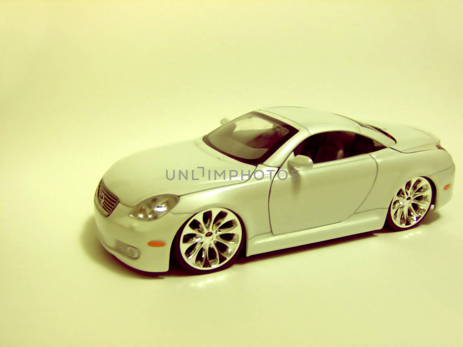 Yellow filter over a shot of this Lexus diecast.