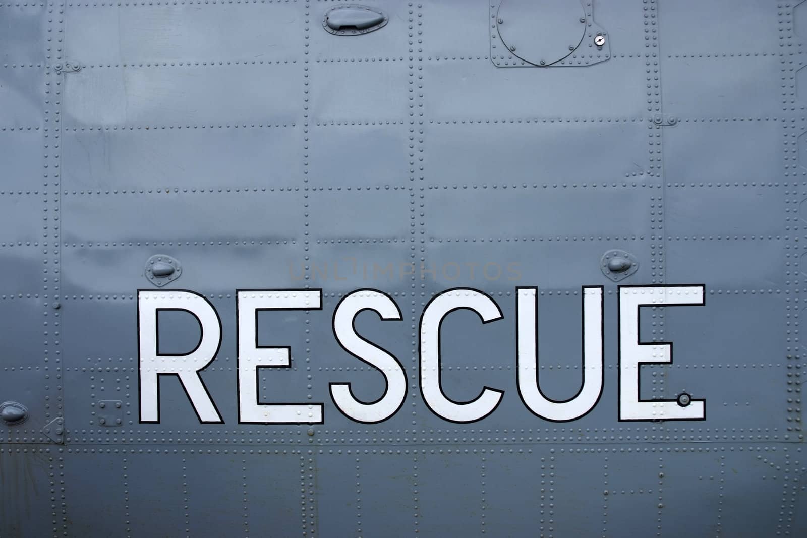 Rescue sign painted in white on a helicopter