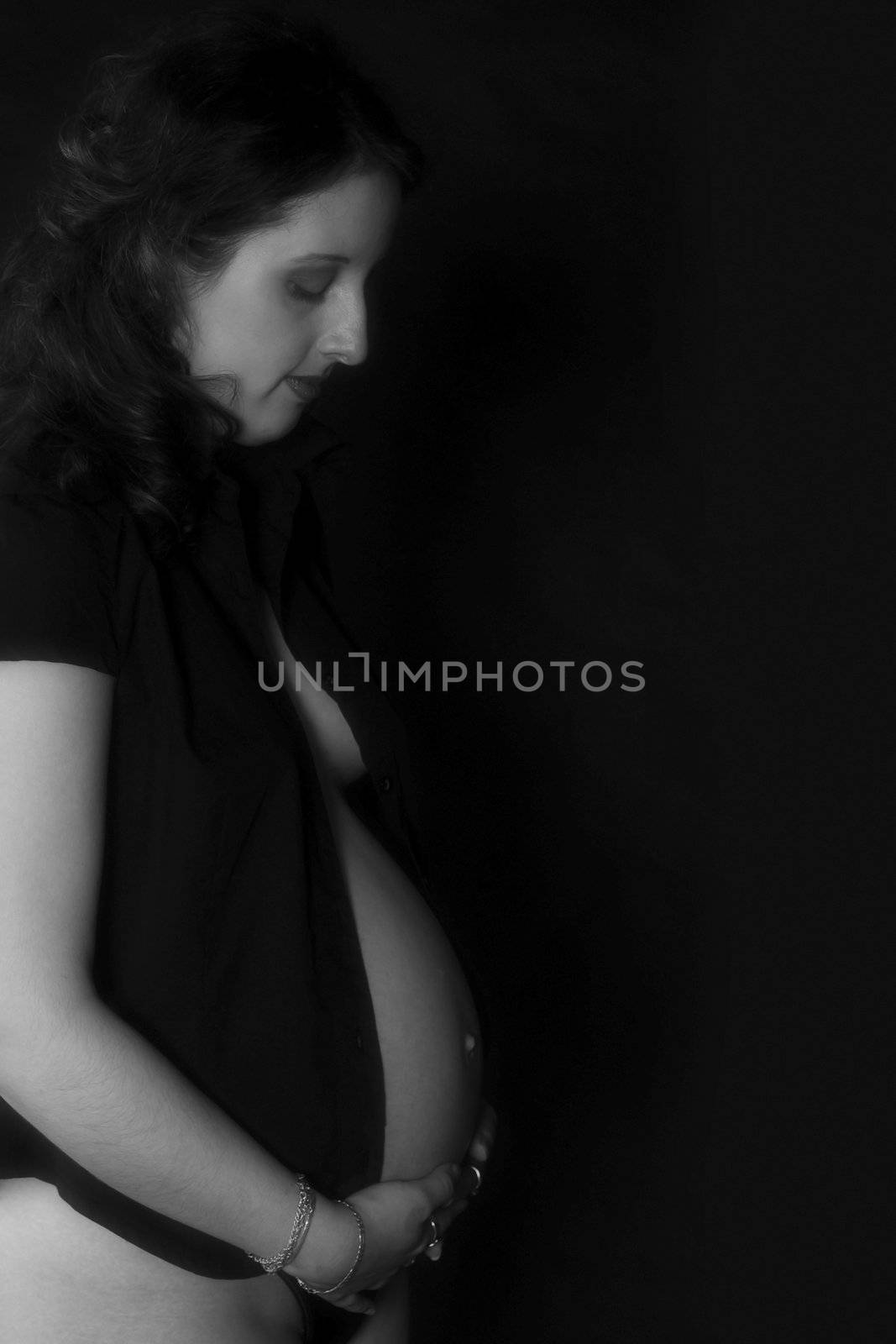 a pregnant woman model portrait in the studio