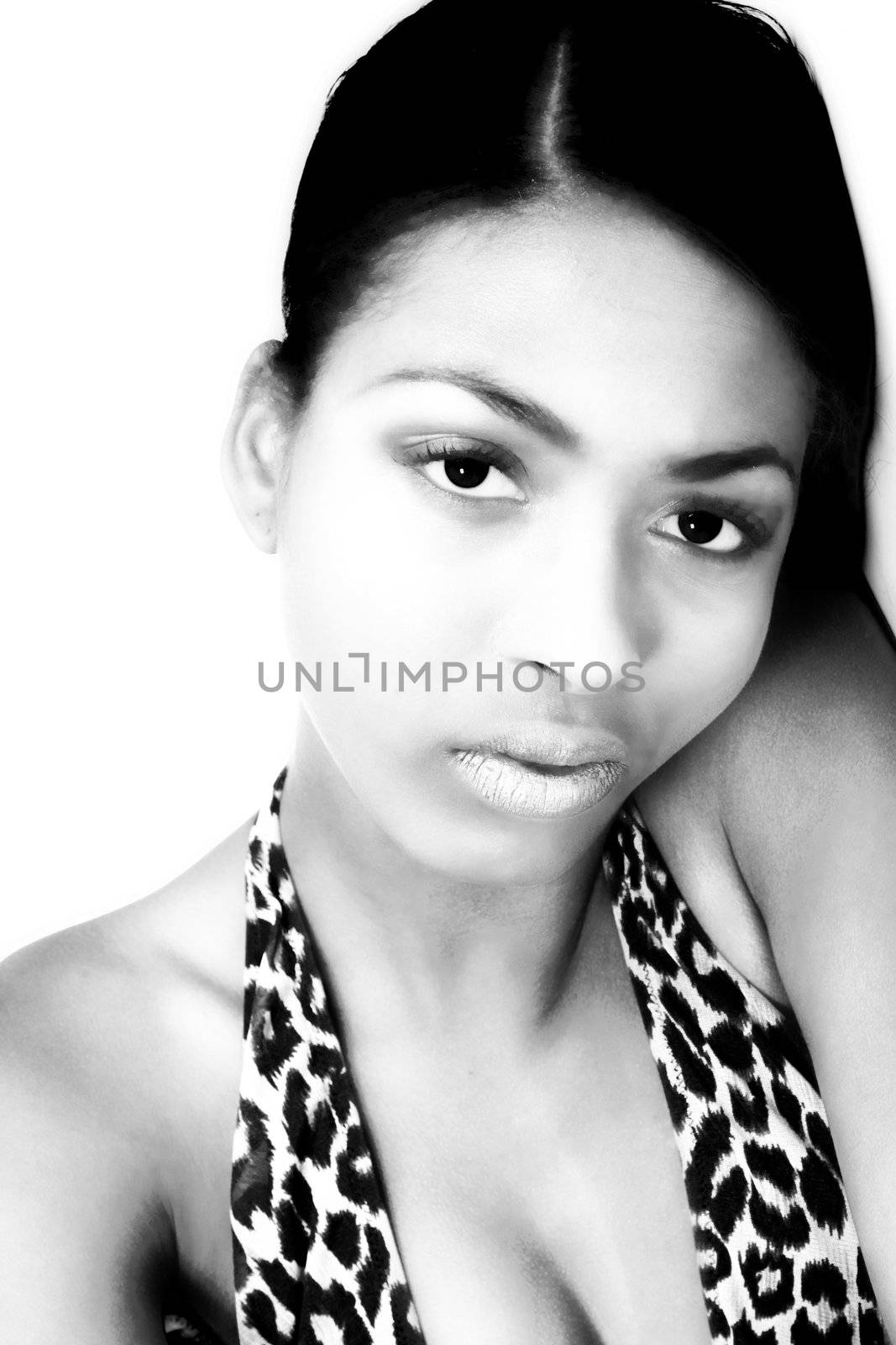 A beauty portrait taken from an african model in the studio in a serious pose