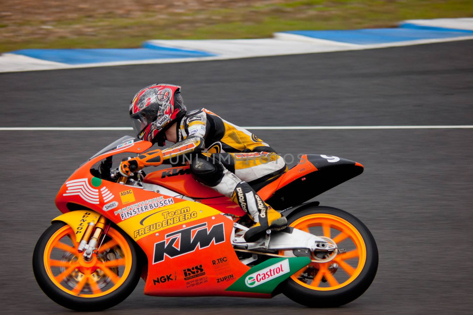 JEREZ DE LA FRONTERA, SPAIN - NOV 20: Toni Finsterbusch pilot of motorcycling of 125cc in the Spanish championship of velocity (CEV) on Nov 20, 2010, in racetrack of velocity of Jerez de la Frontera